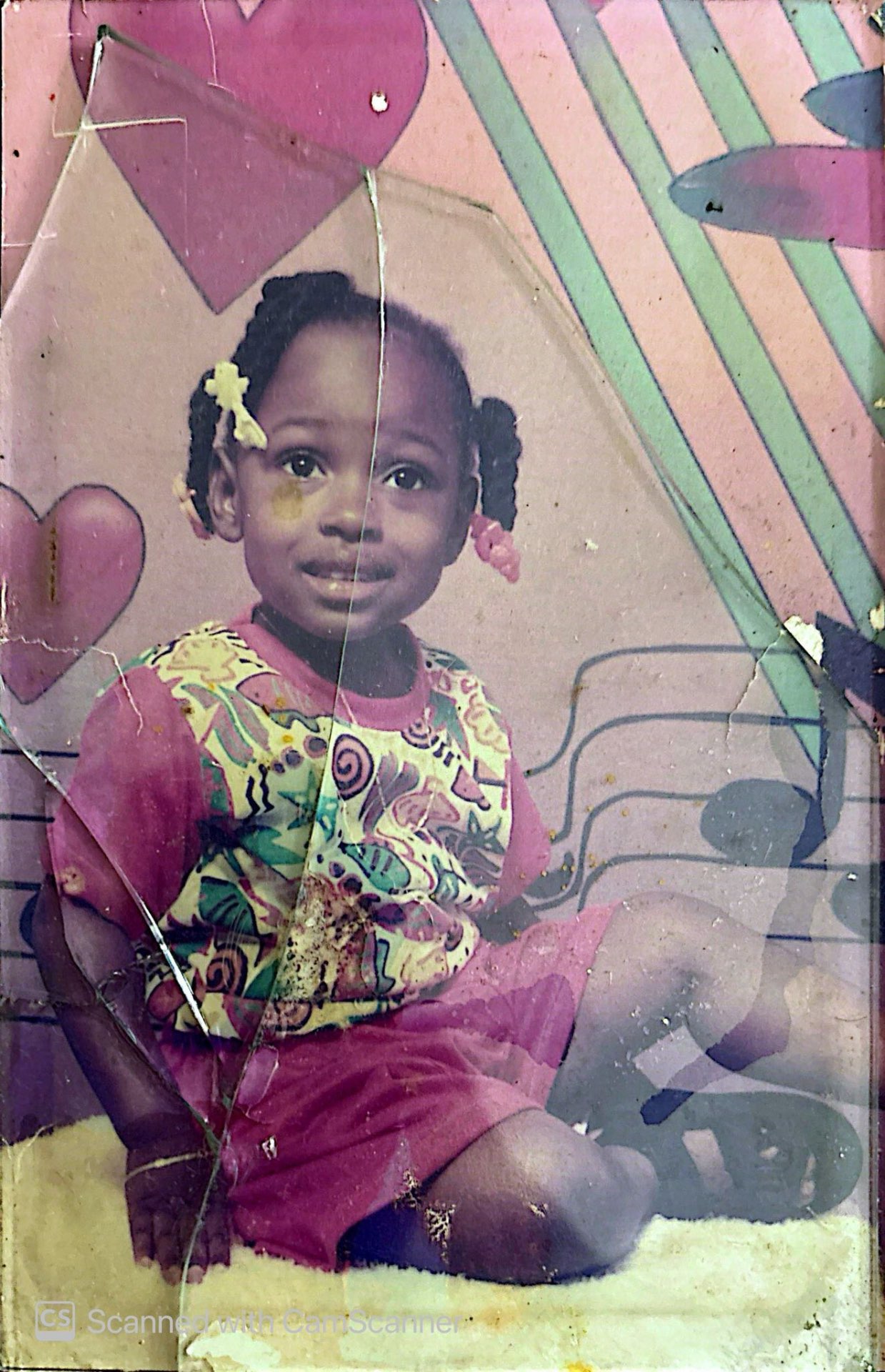 Childhood portrait restored — torn and faded photo brought back to life — original