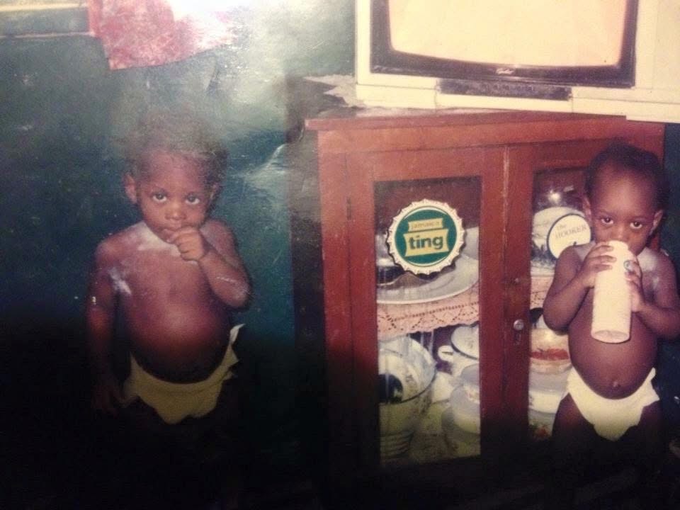 Two children at home — restored — original